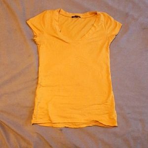 Orange tshirt good condition ambiance size small